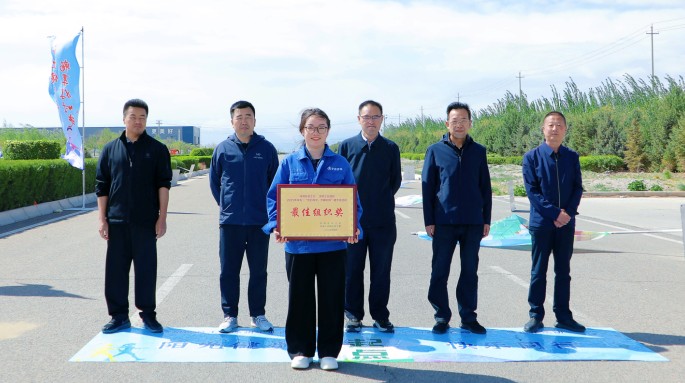 新能源公司組織職工參加武威涼州工業(yè)園區(qū)“匠心向黨 步履不?！甭毠そ〔阶呋顒? title = 